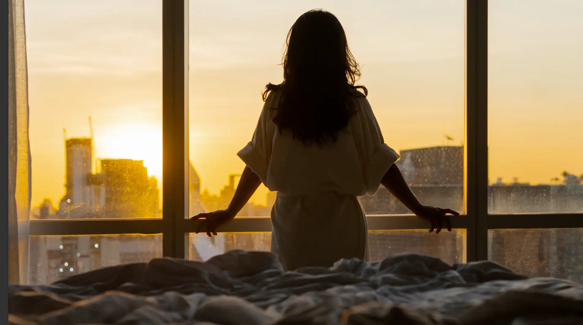 Bedroom at Avenue 8 apartment with sensuous sunset view