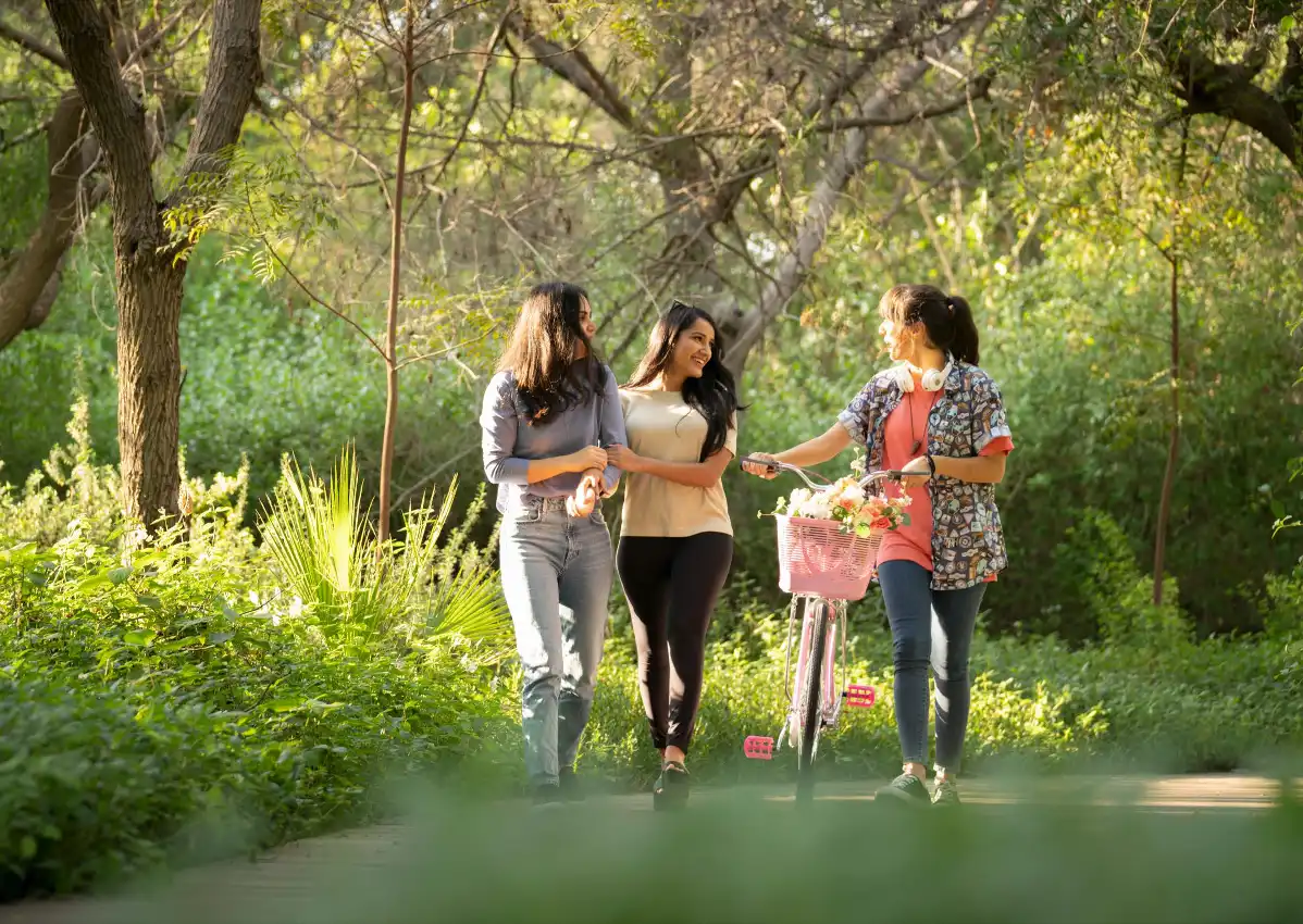 Tree-lined jogging track in Masaar by Arada