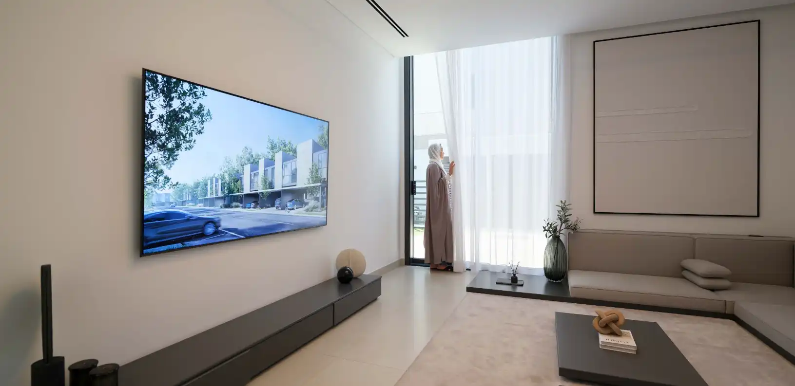 Double-height living room at Anber Masaar with forest views