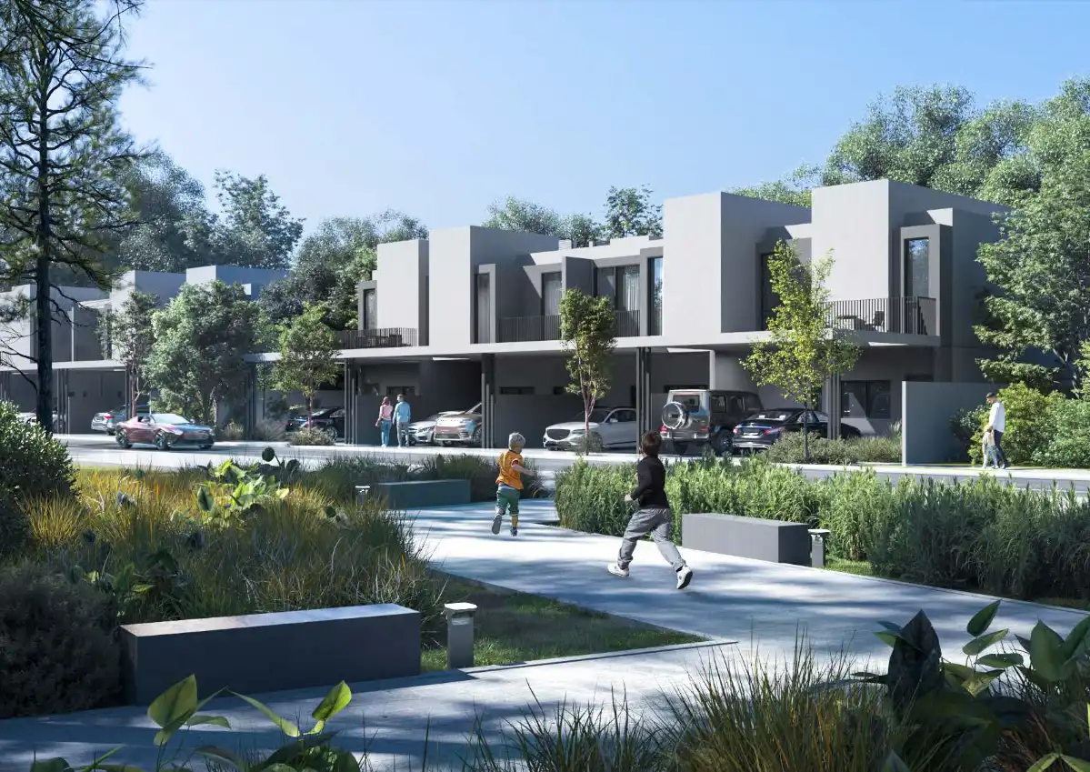 Children playing in villa garden at Anber Masaar community